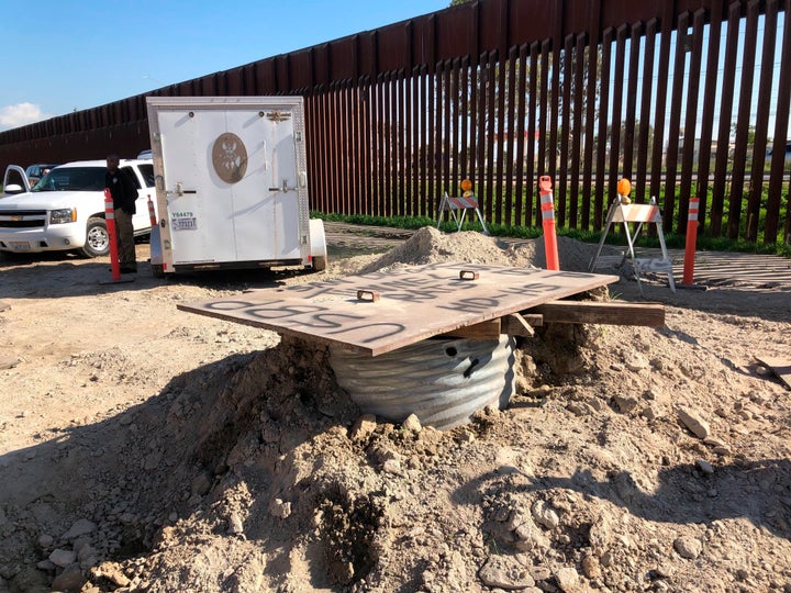 A covered access point leading to a smuggling tunnel is seen on the U.S side of the border wall in San Diego, Calif. on Jan. 29, 2020.