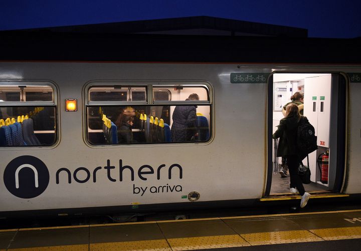Rail passengers commute on a Northern train