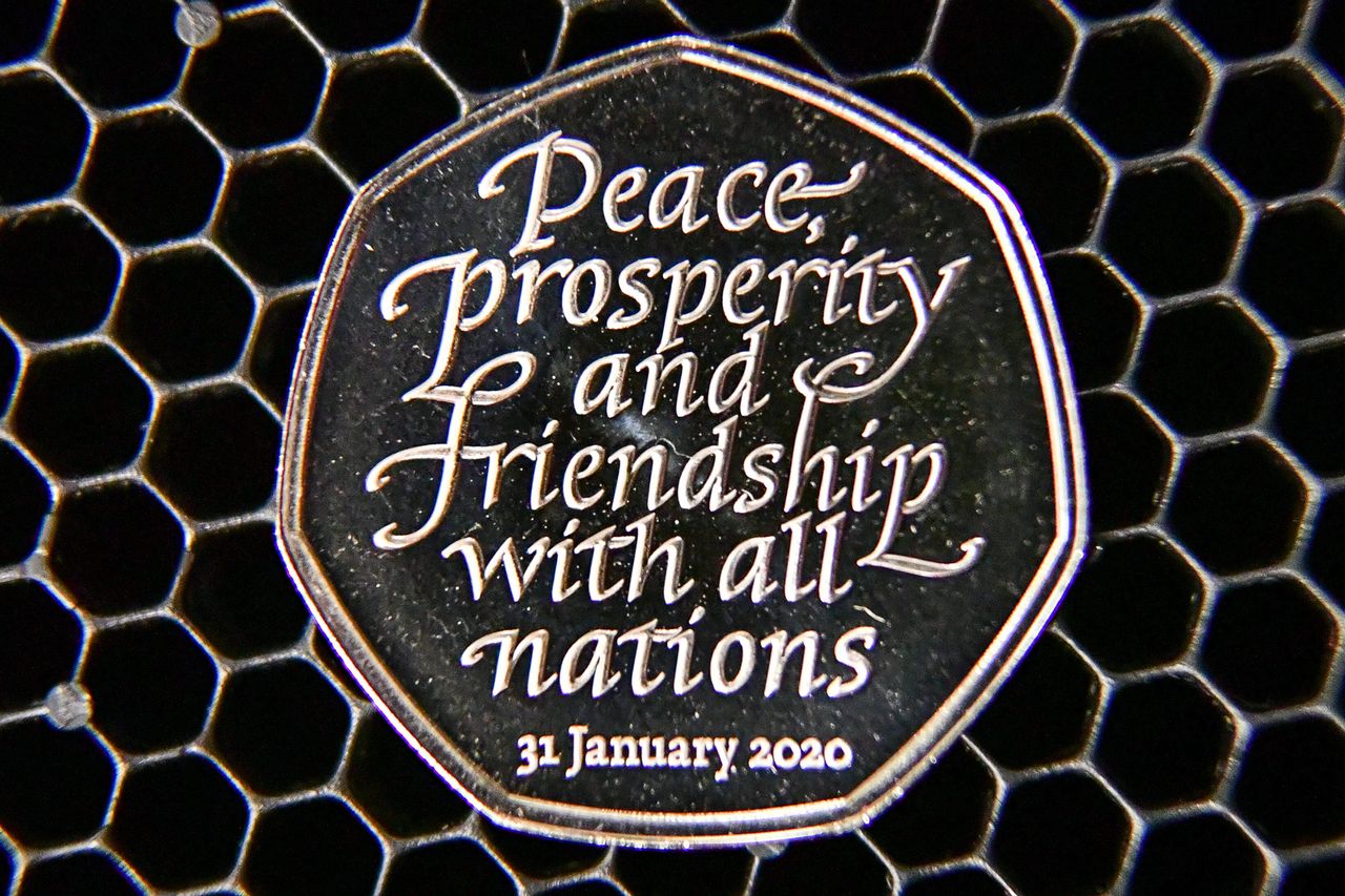 The new 50p Brexit coin, which bears the inscription 'Peace, prosperity and friendship with all nations' and the date the UK leaves the EU.