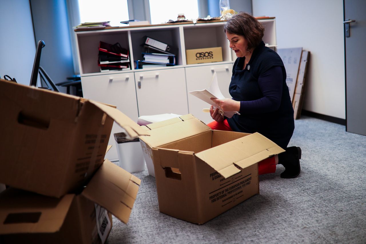 Judith Kirton-Darling, British European Parliament member of the Group of the Progressive Alliance of Socialists and Democrats, packs up her belongings. 
