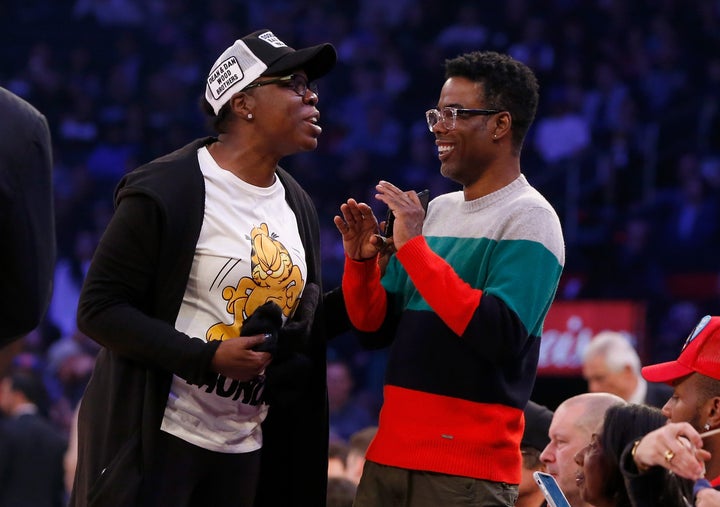 Leslie Jones and Chris Rock attend a game between the New York Knicks and the Golden State Warriors at Madison Square Garden in 2018.