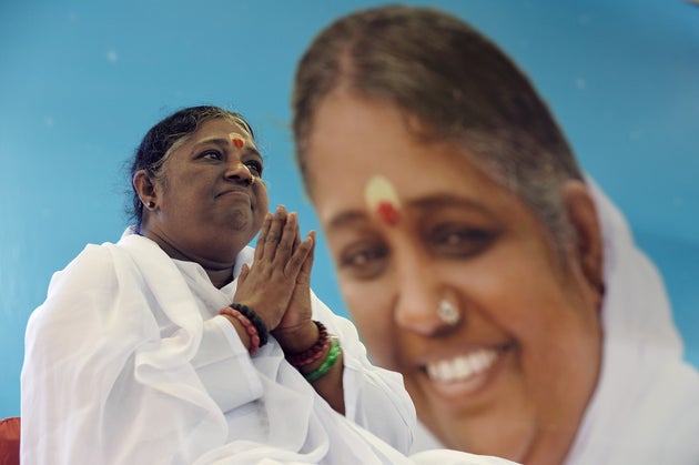 Mata Amritanandamayi attends a public appearance at her ashram in Bangalore on March 14,