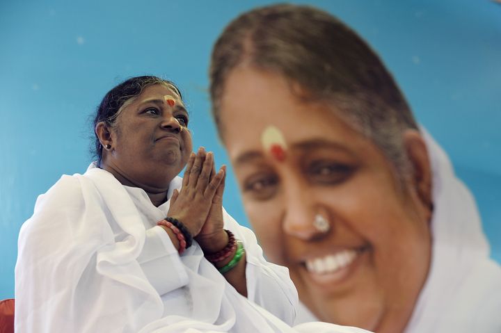 Mata Amritanandamayi attends a public appearance at her ashram in Bangalore on March 14, 2016.
