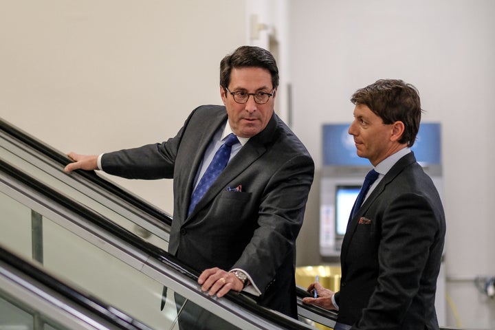 Jay Sekulow (left) speaks with Hogan Gidley, White House Principal Deputy Press Secretary, during the Senate impeachment trial against President Donald Trump at the U.S. Capitol on January 24, 2020 in Washington, DC. 