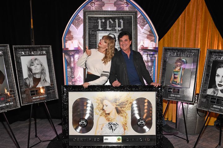 Taylor Swift and Big Machine Records CEO Scott Borchetta at a plaque presentation backstage at MetLife Stadium on July 21, 2018, in East Rutherford, New Jersey.