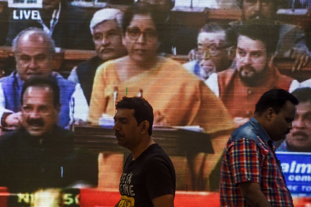 A screen displaying a television channel live broadcast of Nirmala Sitharaman presenting the 2020 union