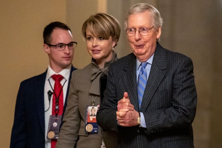 Senate Majority Leader Mitch McConnell (R-Ky.) walks to meet with Senate Republicans on Capitol Hill on Jan. 31 after the Senate voted not to allow witnesses in the impeachment trial of President Donald Trump.
