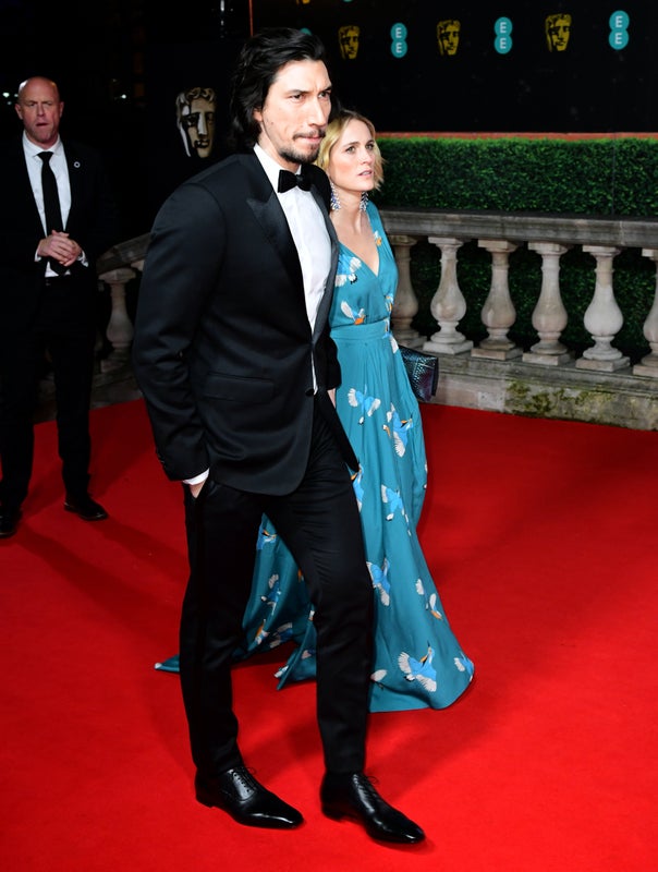 Adam Driver and Joanne Tucker attending the 73rd British Academy Film Awards held at the Royal Albert Hall, London.