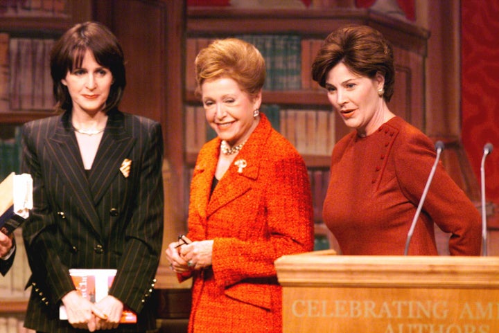 First lady Laura Bush, right, greets authors Carol Higgins Clark, left and Mary Higgins Clark, center, at the conclusion of a