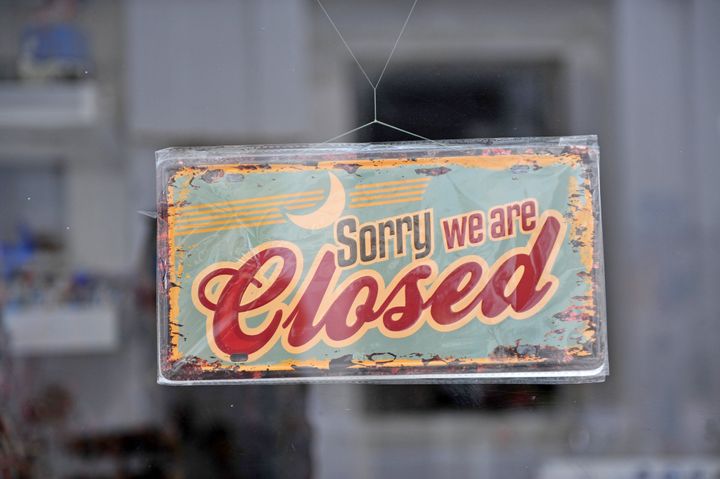 Closed sign in the street shop