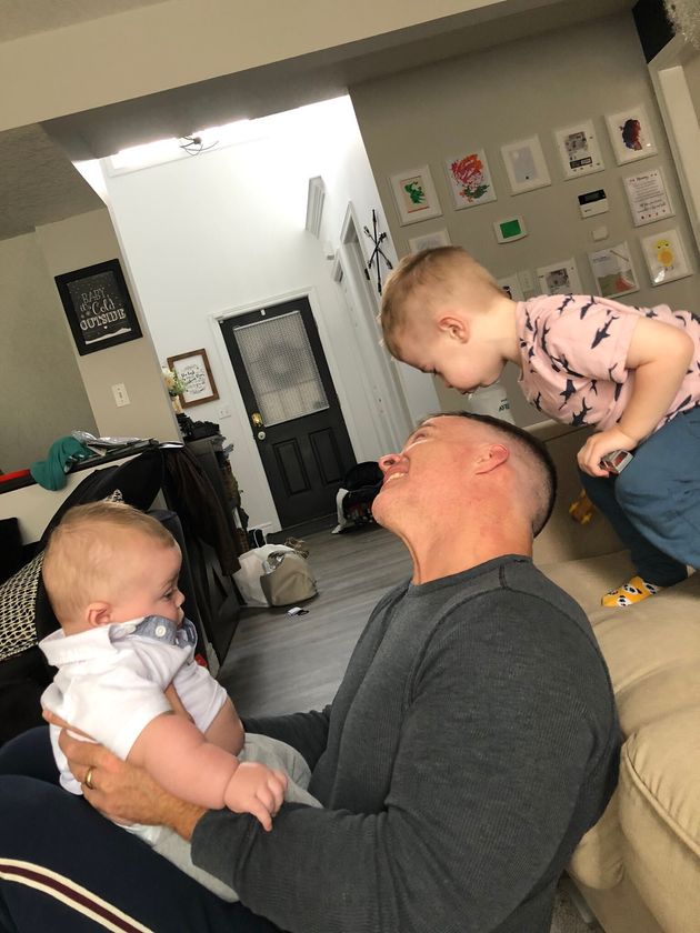 Tyson Dux loves wrestling with his kids, which he says is a way to roughhouse in a safe, controlled way.