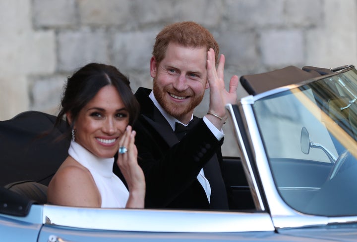 Meghan Markle and Prince Harry on the way to their evening wedding reception at Frogmore House in Berkshire, England, on May 19, 2018.