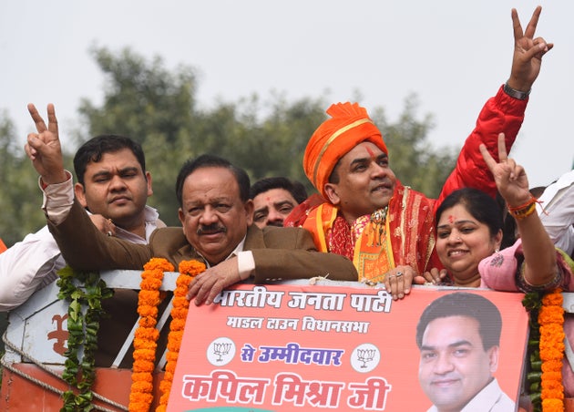 BJP candidate from Model Town Kapil Mishra along with Union Minister of Health and Family Welfare Harsh...