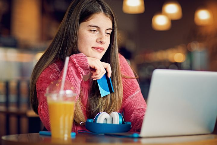 A teenage girl is seen here in a stock photo. A new report suggests 63 per cent of Canadian Gen Zs are credit active compared to only 50 per cent in the U.S.