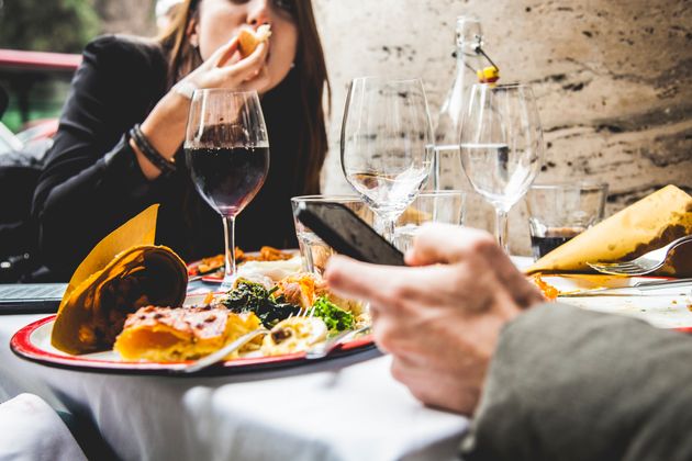 Put your phone away when you're dining with someone at a restaurant. 