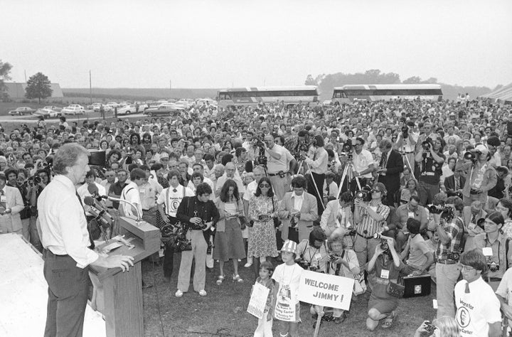 Then-presidential candidate Jimmy Carter speaks to a crowd of supporters on the Van Ryswyk farm in Des Moines, Iowa, on Aug. 24, 1976.