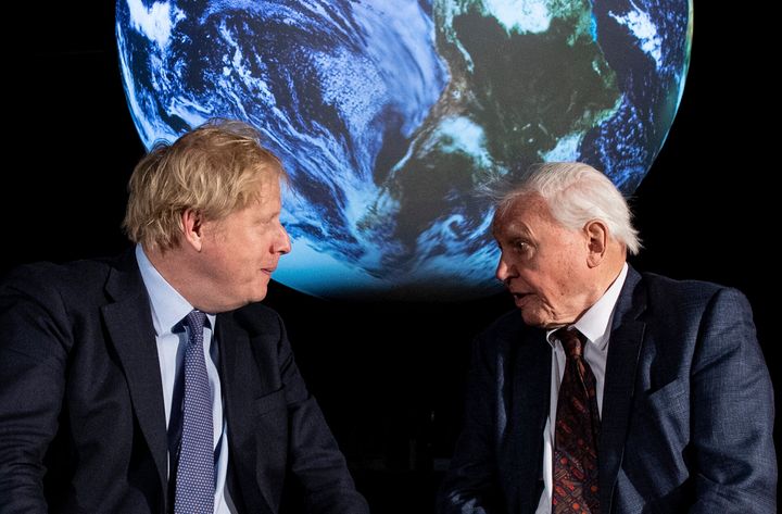 Britain's prime minister Boris Johnson talks with David Attenborough during the launch of the upcoming UK-hosted COP26 UN climate summit.