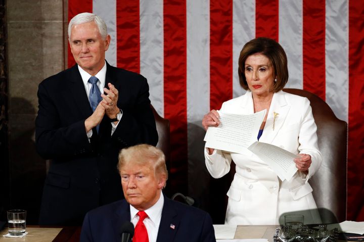 House speaker Nancy Pelosi tears her copy of president Donald Trump's State of the Union address after he delivered it to a joint session of Congress.