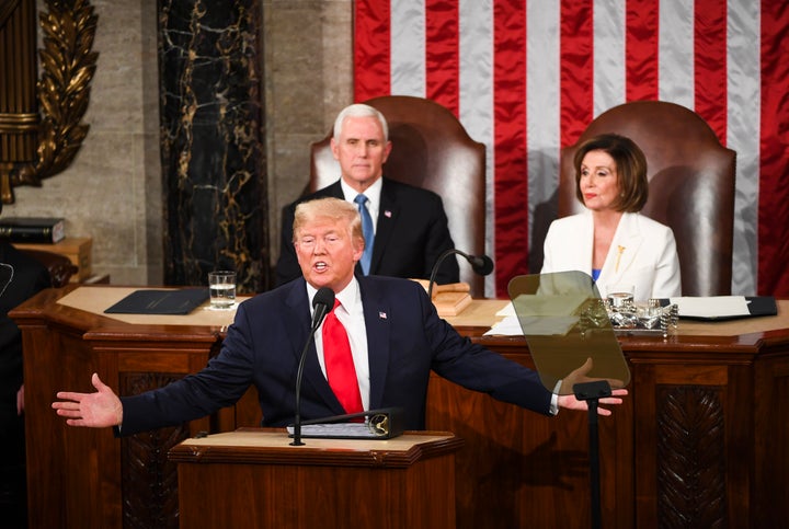 Trump delivers his State of the Union address in front of Vice President Mike Pence and House Speaker Nancy Pelosi (D-Calif.) to members of Congress.