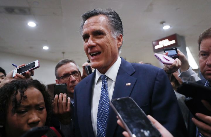 Sen. Mitt Romney speaks to reporters upon arrival for the Senate impeachment trial on Jan. 29, 2020 in Washington, DC. 