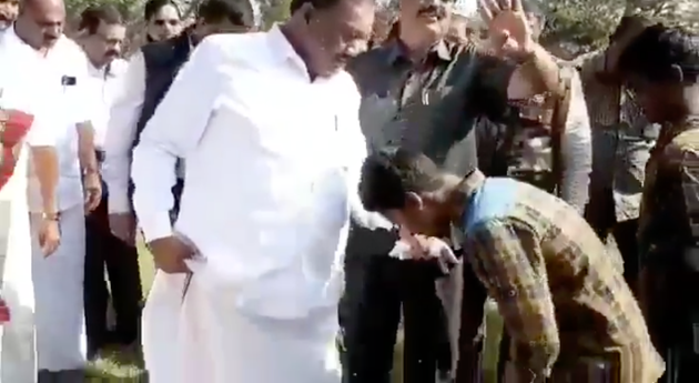 Forest Minister Dindigul C Sreenivasan has children from the tribal community remove his