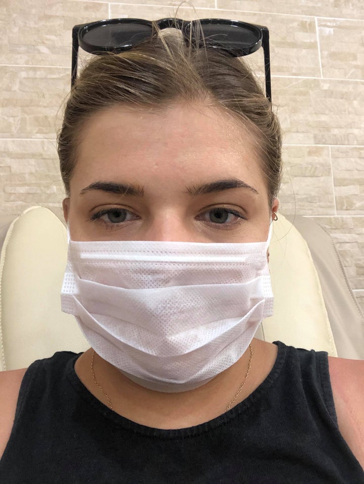 Nail salon in Sydney's Redfern asks customers to wear masks amid coronavirus panic. 