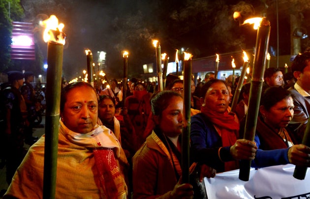 Activists of All Assam Students Union (AASU) along with 30 organisations taking out a torchlight rally...