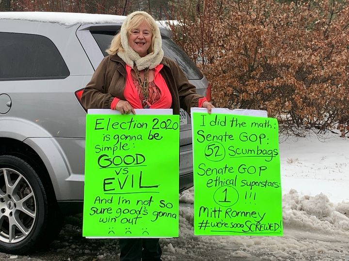 A woman stood outside Pete Buttigieg's town hall in Merrimack, New Hampshire, to give thanks to Sen. Mitt Romney for voting to convict President Donald Trump on one impeachment charge.
