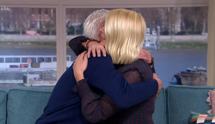 Holly gave Phillip a big hug after their interview