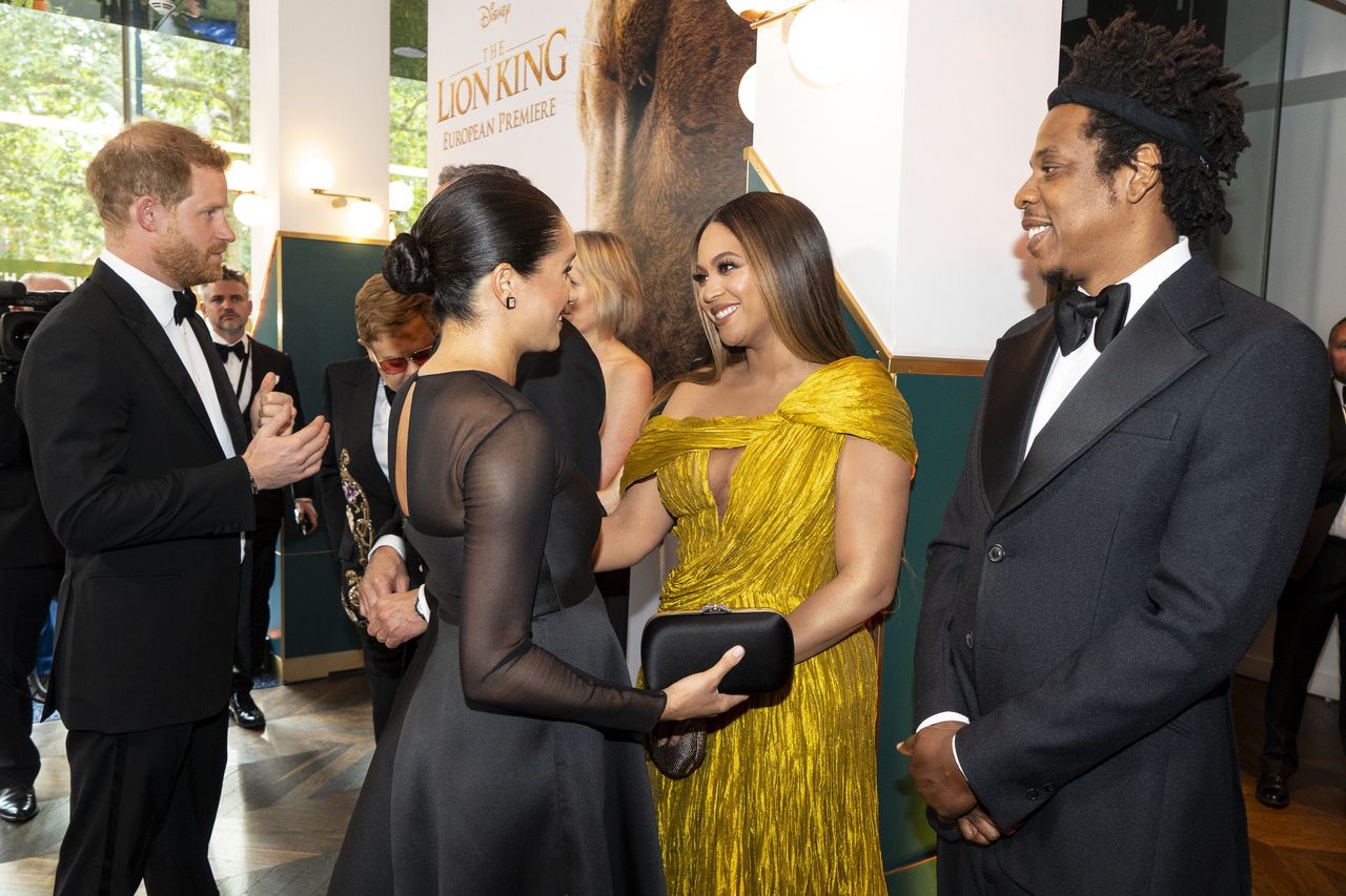 Meghan and Harry greet Beyoncé and Jay-Z as they attend the European premiere of Disney's "The Lion King" in London on July 14, 2019.