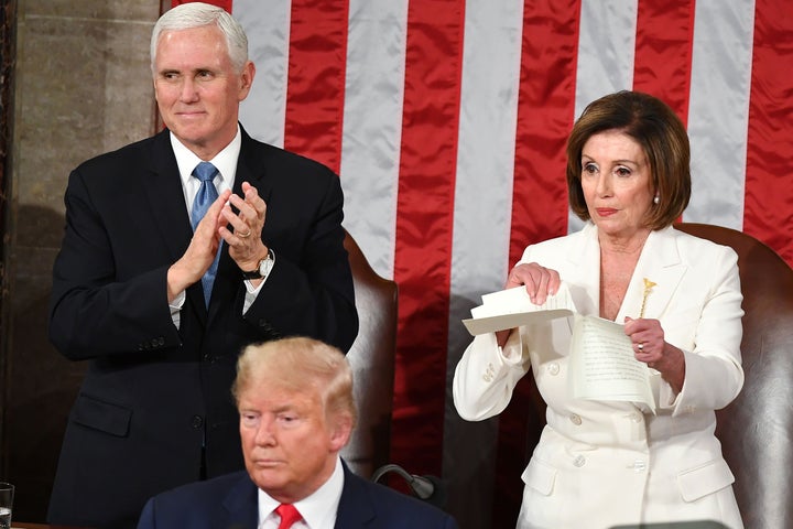 Speaker of the U.S. House of Representatives Nancy Pelosi rips a copy of President Donald Trump's in Washington, D.C., on Feb. 4, 2020.