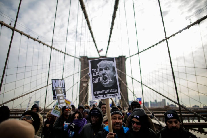 People take part in a protest against U.S. President Donald Trump on Jan. 19, 2018, shortly after his reported "shithole countries" comment.