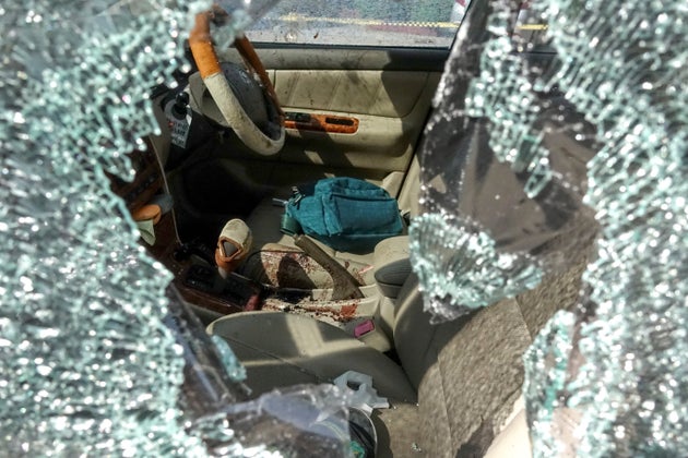 SENSITIVE MATERIAL. THIS IMAGE MAY OFFEND OR DISTURB Bullet holes and blood are seen in a victim's car following a gun battle involving a Thai soldier on a shooting rampage, in Nakhon Ratchasima, Thailand, February 9, 2020. REUTERS/Athit Perawongmetha