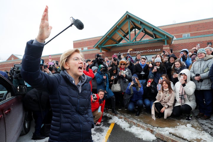 Democratic 2020 presidential candidate and Senator Elizabeth Warren (D-MA) speaks to volunteers outside a campaign canvass ki