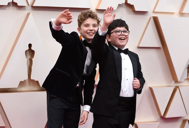 Roman Griffin Davis and Archie Yates having a blast in their Oscars red carpet photoshoot.
