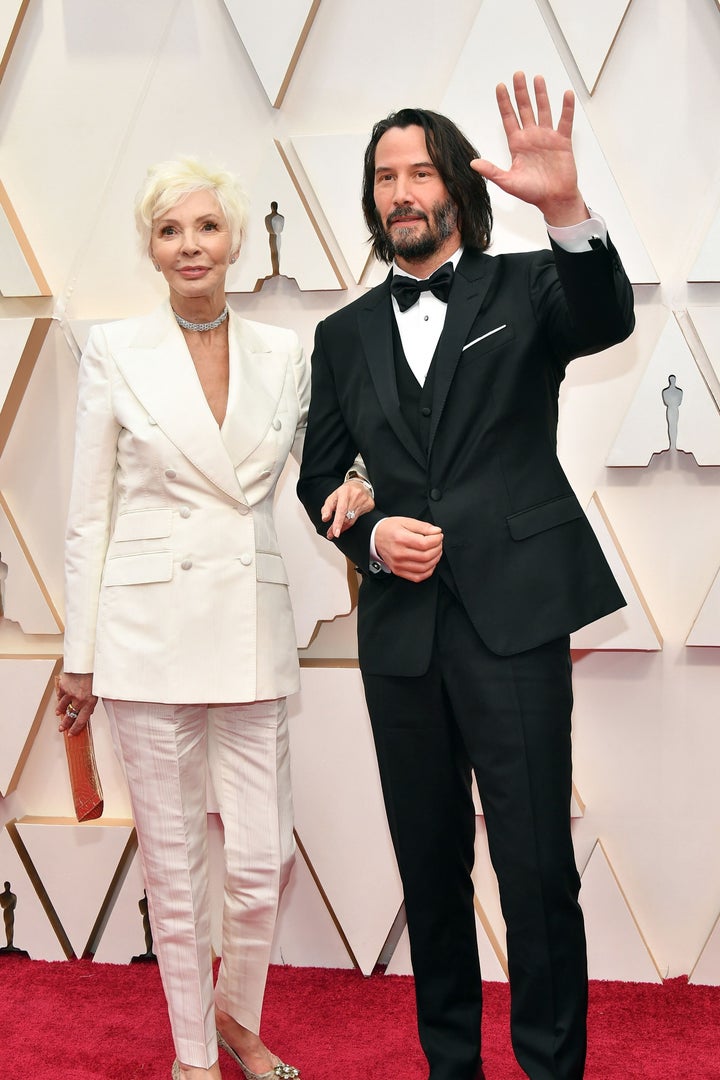 Patricia Taylor and Keanu Reeves attend the 92nd Annual Academy Awards at Hollywood and Highland on Feb. 9 in Hollywood, California.