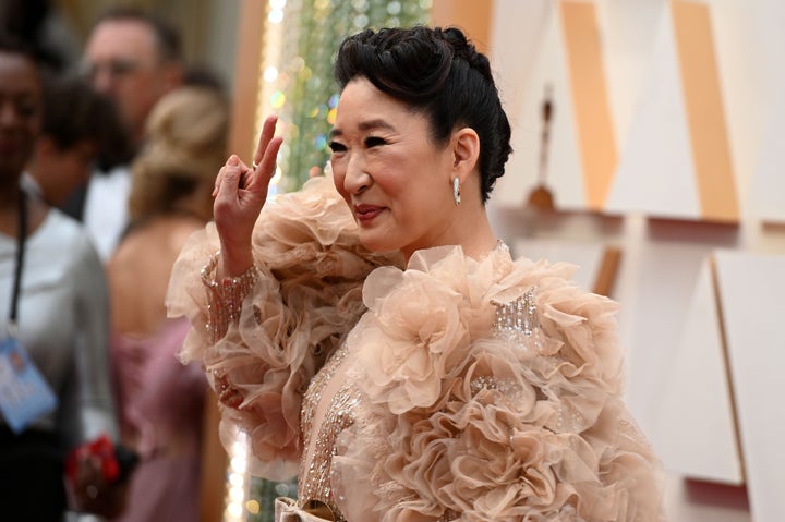 Sandra Oh arrives with her enormous sleeves for the 92nd Oscars at the Dolby Theatre in Hollywood on Sunday.