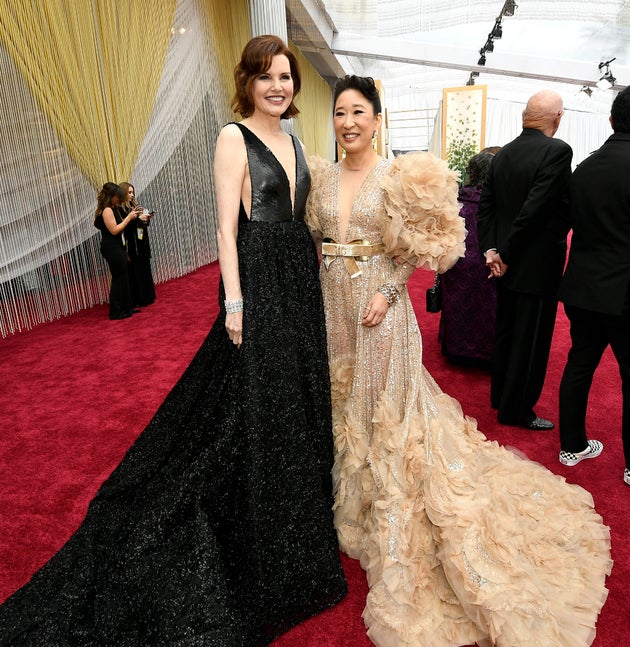 You know when you can hold your own against Geena Davis' dramatic look that your dress is, in a word,