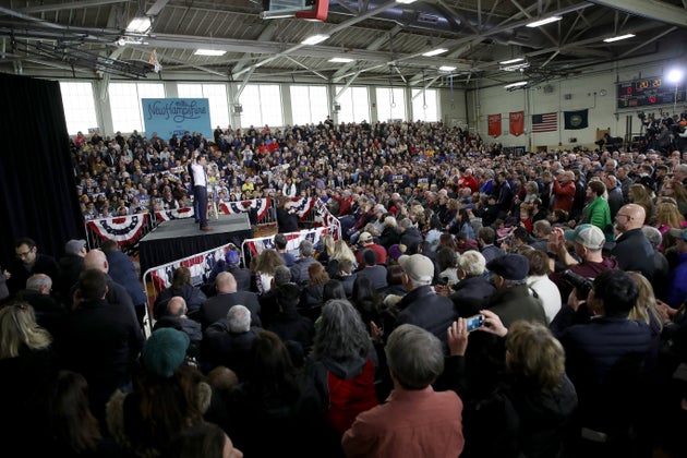 Members of the audience listen to Democratic presidential candidate Pete Buttigieg speak at a Get Out the Vote rally at Elm Street Middle School on Feb. 9 in Nashua, New Hampshire.