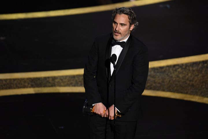 Joaquin Phoenix accepts the Actor In A Leading Role award for Joker onstage during the 92nd Annual Academy Awards.