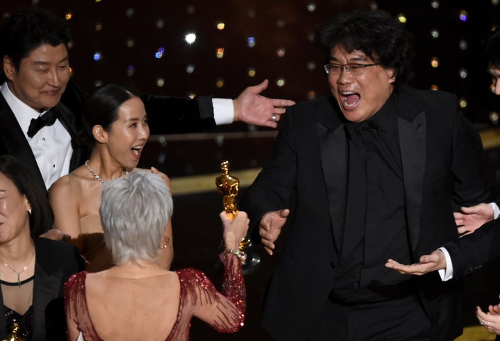 'Parasite' Director Bong Joon-ho accepting the Oscar for Best Picture from presenter Jane Fonda at the Dolby Theatre in Los Angeles. 