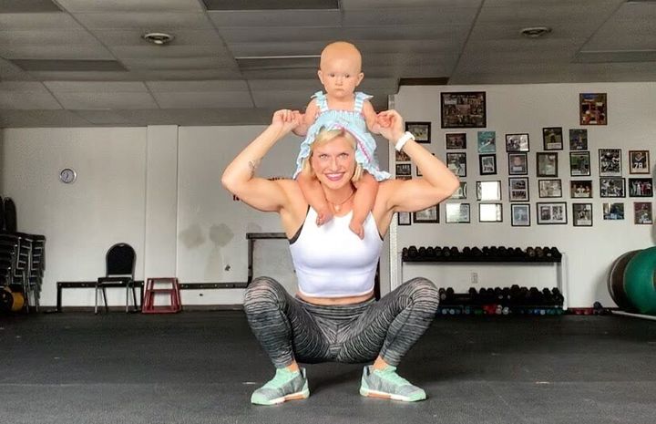 Musser and her daughter working out together.
