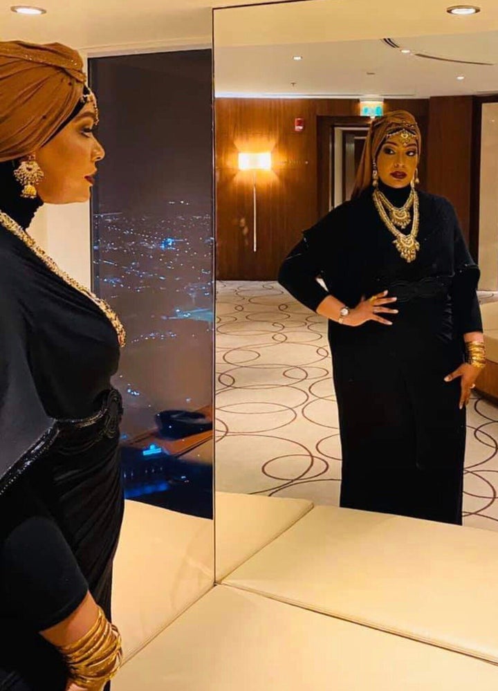 “I really used to struggle with the thought of wearing a scarf full-time because so much of my beauty was wrapped up in my hair," says Khalid.