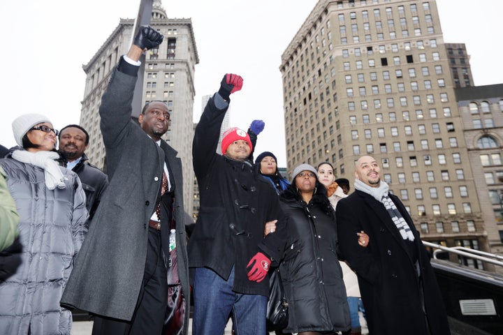 Yusef Salaam, left, with Kevin Richardson and Raymond Santana at a rally with supporters in New York, after a hearing in their lawsuit against the city, Jan. 17, 2013.