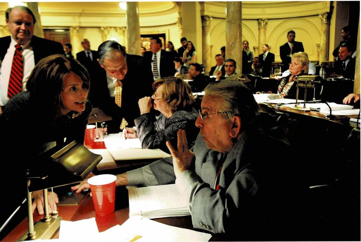 Practicing the politics of persuasion. I’m on the Senate floor trying to wrangle a yes vote on the school funding bill from Republican Sen. Joseph A. Palaia, with Senate President Dick Codey looking on. In the end Sen. Palaia switched his no vote to a yes.