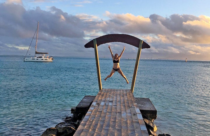 Jumping off our dock in Huahine for a swim.