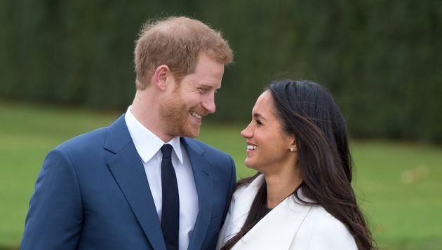 Harry and Meghan attend a photocall in the Sunken Gardens at Kensington Palace following the announcement of their engagement on Nov. 27, 2017.