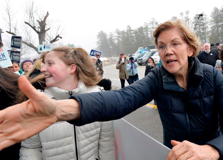 Sen. Elizabeth Warren greets supporters during the New Hampshire primary at Amherst Elementary School in Nashua, New Hampshire, on Feb. 11, 2020. 