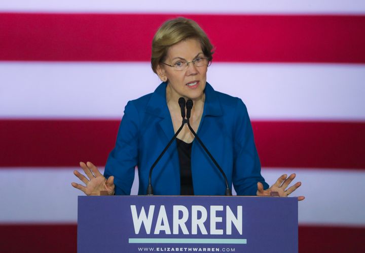 Sen. Elizabeth Warren (D-Mass.) addresses her supporters Tuesday in Manchester, New Hampshire. She sought to put a positive spin on a disappointing outcome.