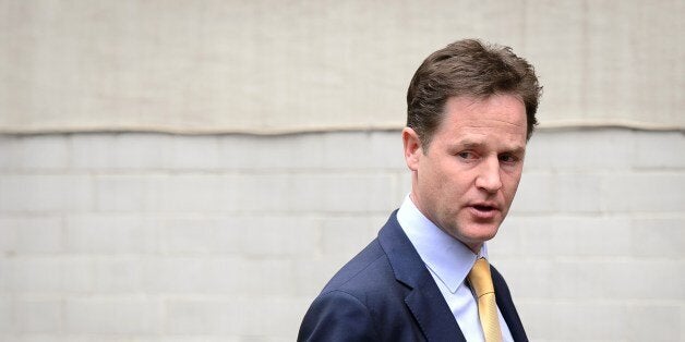 Liberal Democrat party leader Nick Clegg leaves the party headquarters in Westminster, central London, on May 26, 2014. The eurosceptic UK Independence Party (UKIP) of Nigel Farage topped the poll in European elections in Britain, ratcheting up the debate on British membership of the EU. AFP PHOTO/Leon Neal (Photo credit should read LEON NEAL/AFP/Getty Images)